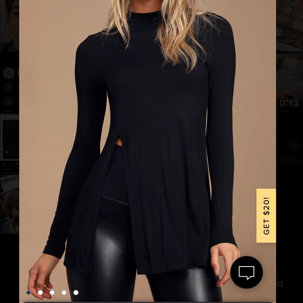Lulus black long sleeve top. Slight turtle neck and a slit down the side
